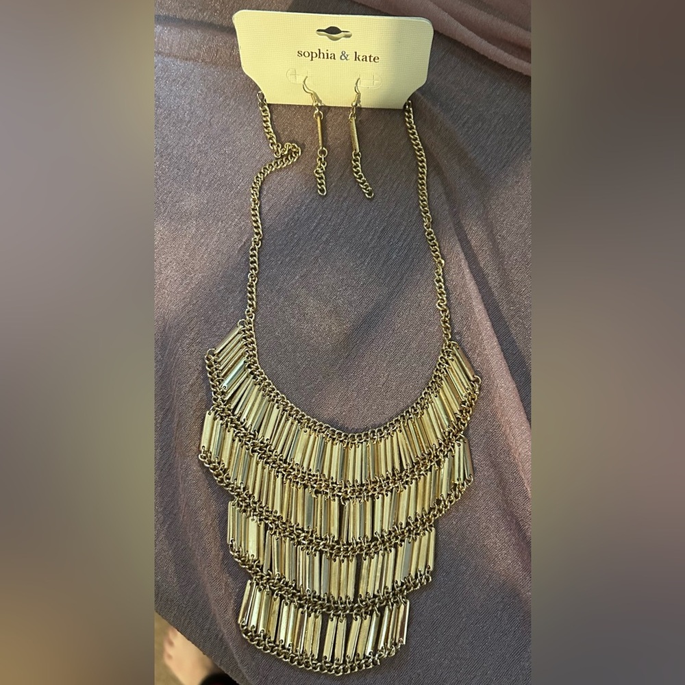 Matching bib necklace and earrings.